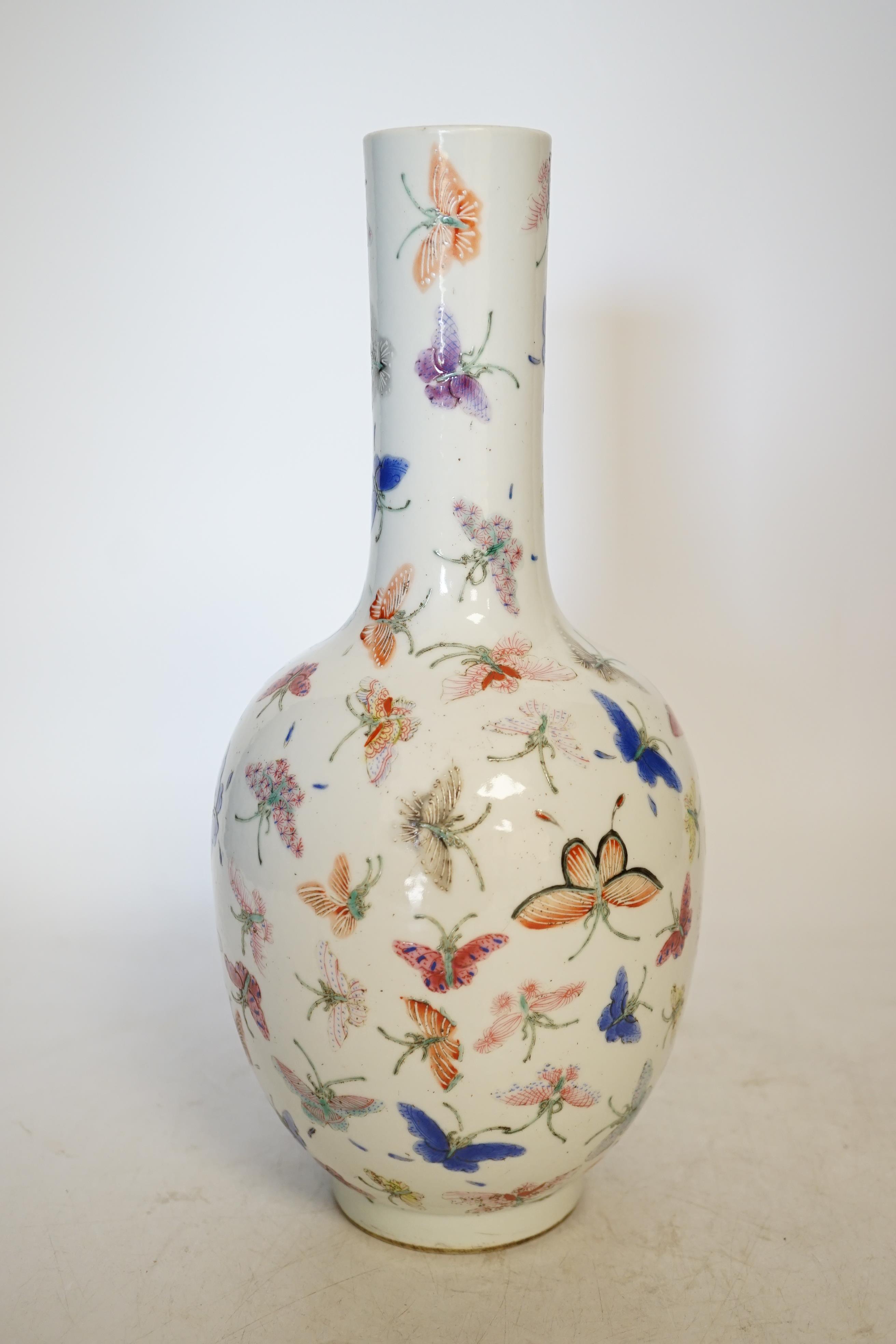 A Chinese famille rose ‘butterflies’ vase, 29cm high. Condition - good